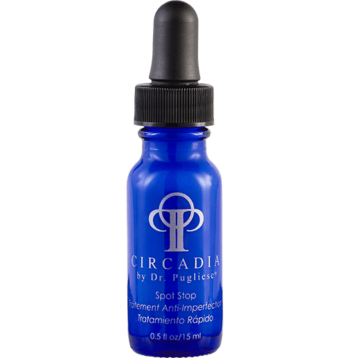 A blue bottle with a black dropper cap for a skincare product labeled 'Ciradia by Dr. Puglise Spot Stop' with additional text indicating its use for 'Blemishes of mild to moderate severity'.