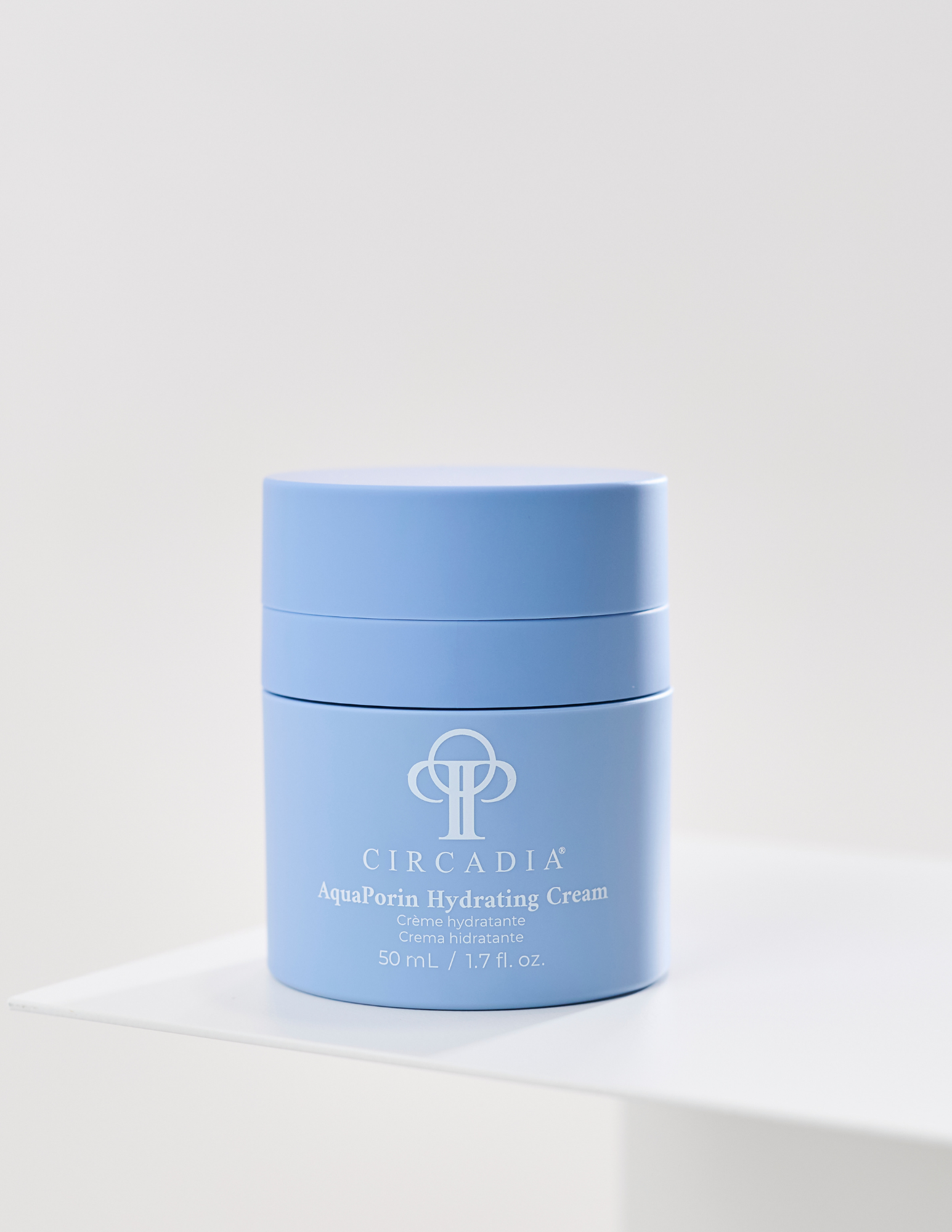 Blue jar of Circadia Aquatherm Hydrating Cream on a white background