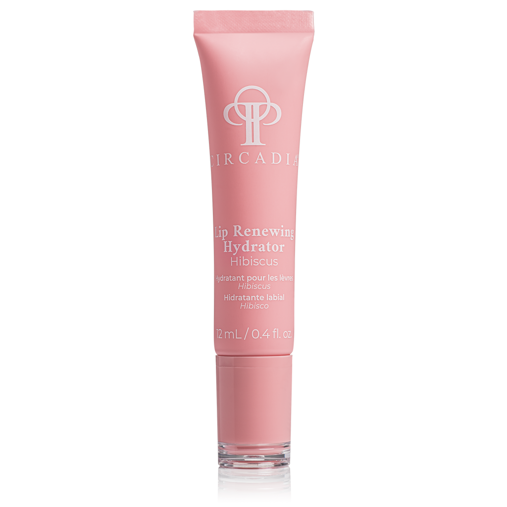 Pink lip balm tube with brand logo on a white background