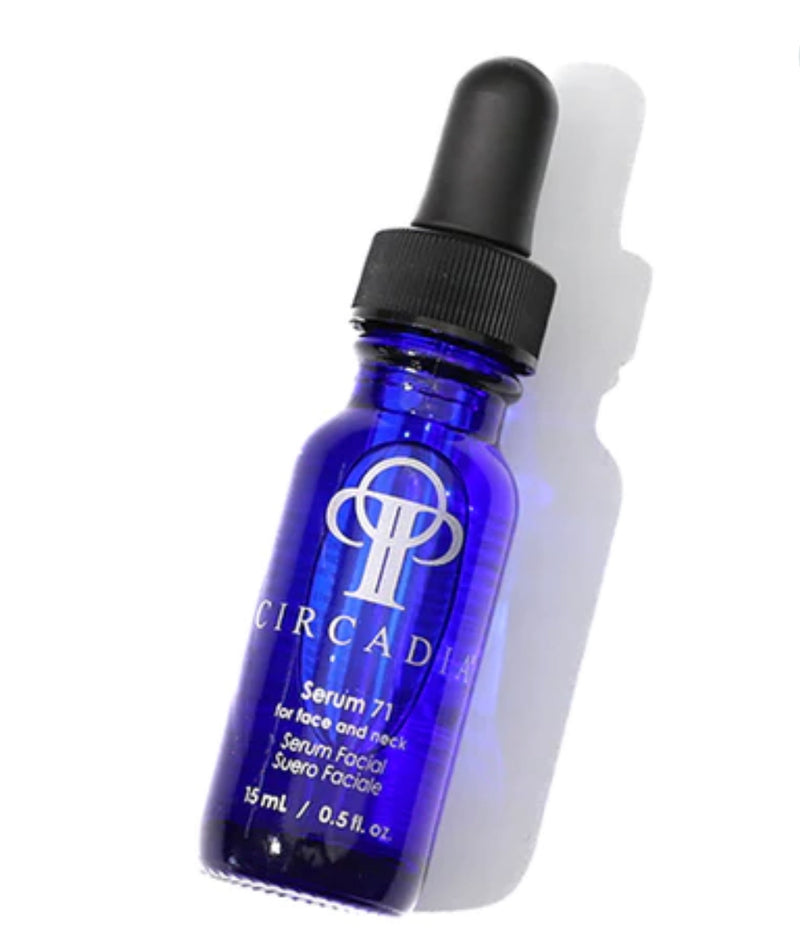 A blue dropper bottle labeled 'CIRCADIA Serum 71', indicating a skin care product.