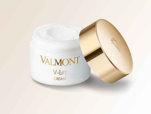 A jar of Valmont V-Lift Cream with a gold lid on a light background.