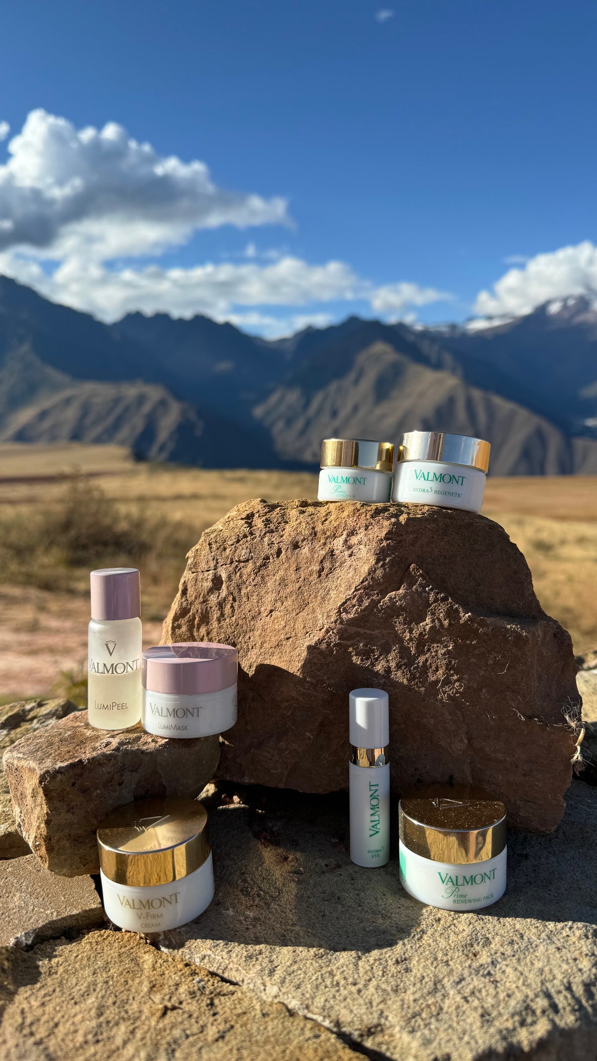Valmont products on a rock with mountainous landscape in the background